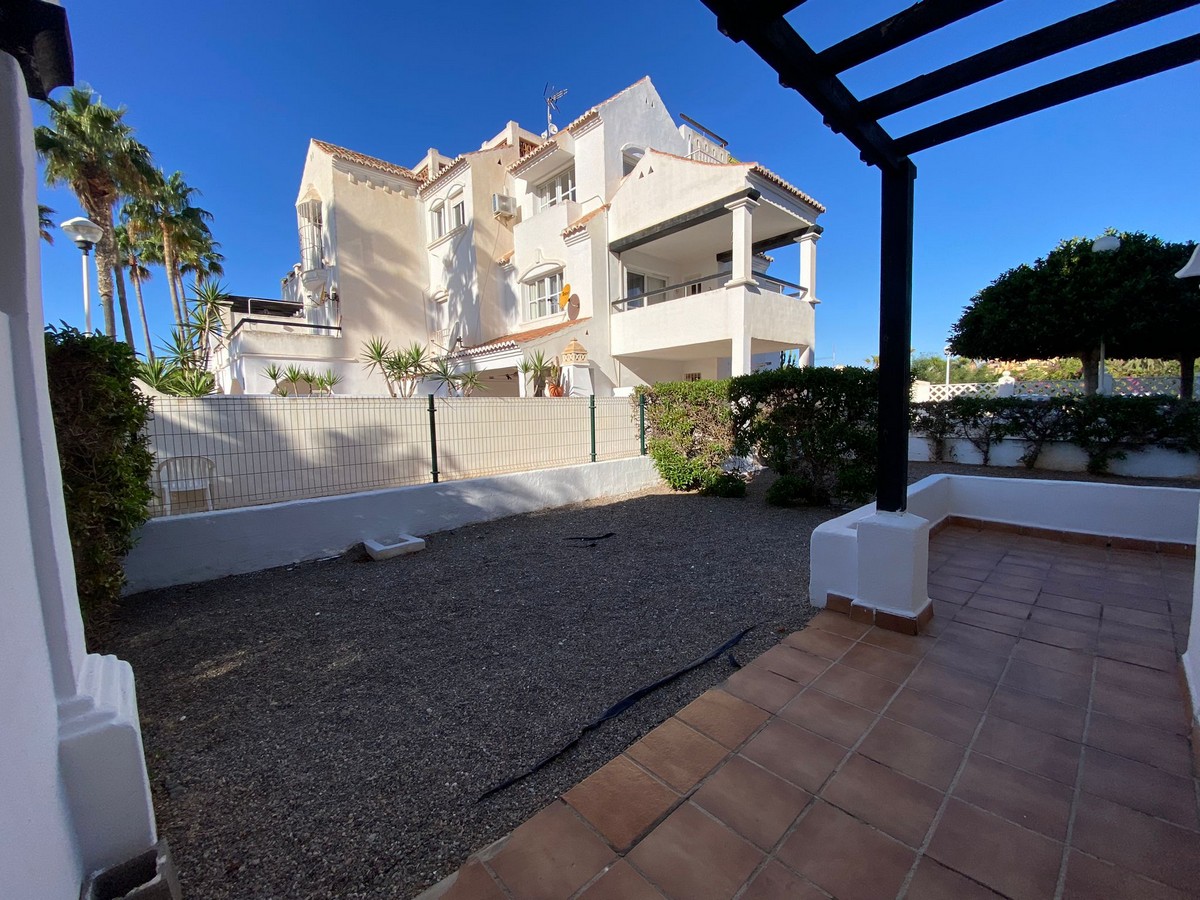 Apartamento en planta baja con jardín, Complejo Golf Center Pueblo
