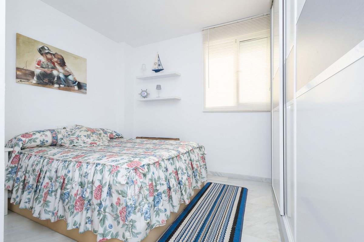 Exclusivo apartamento frente al mar con jardín privado en Complejo Marina Serena Golf