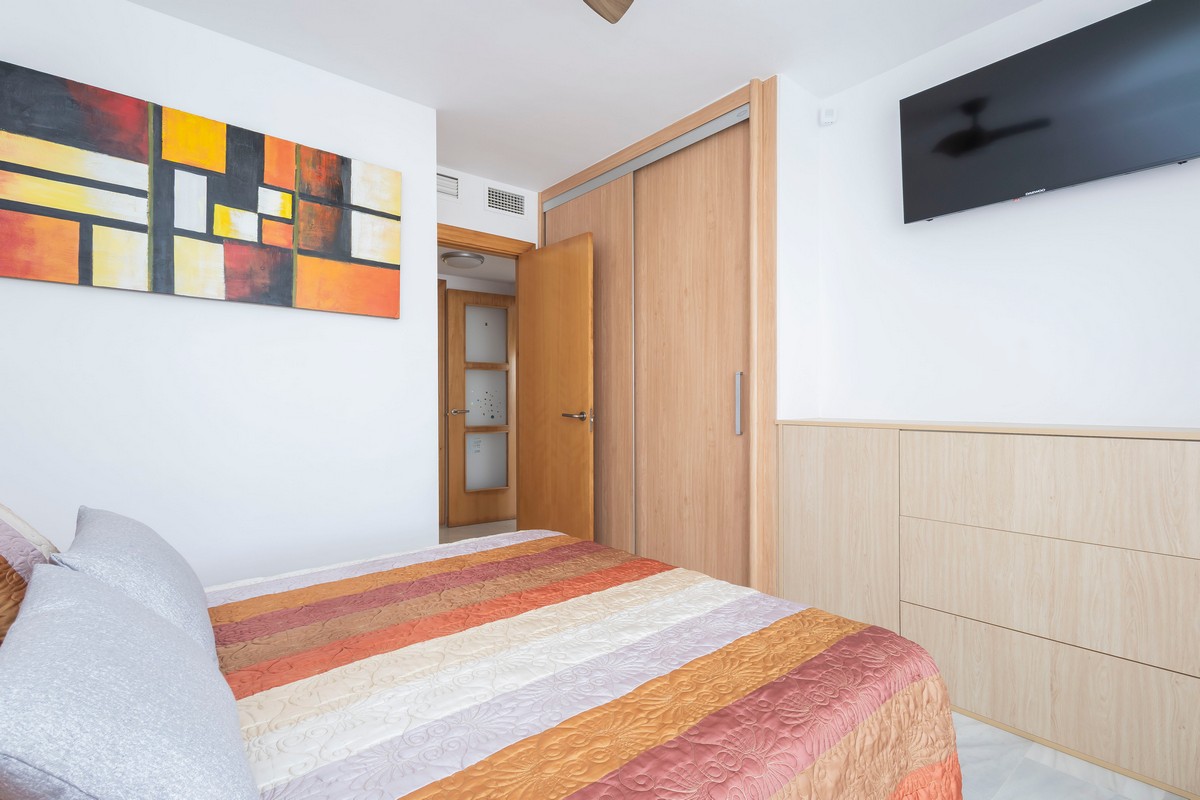 Exclusivo apartamento frente al mar con jardín privado en Complejo Marina Serena Golf